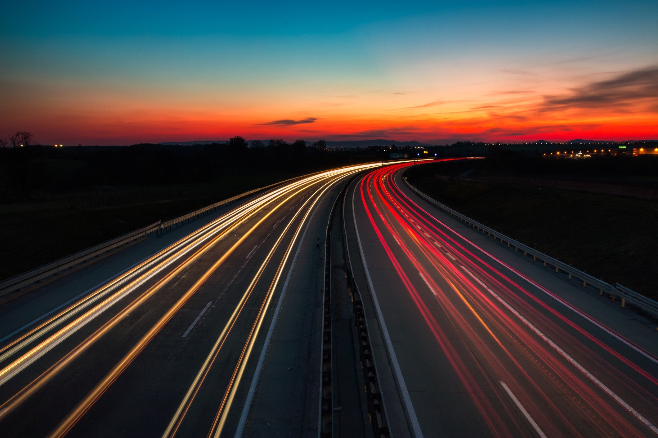 light trails on a highway road at night