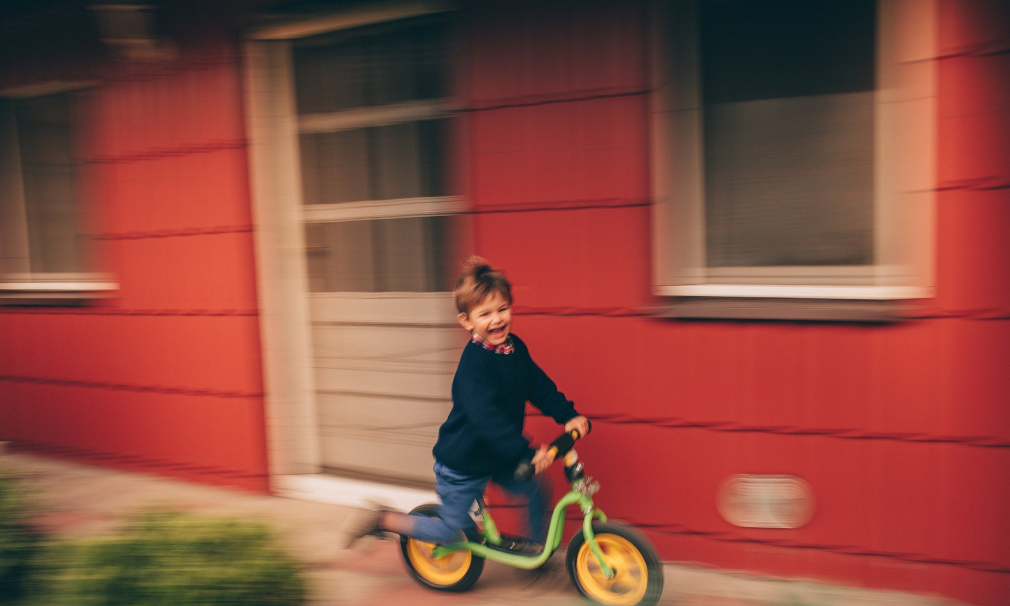 happy child enjoying his ride on bicycle