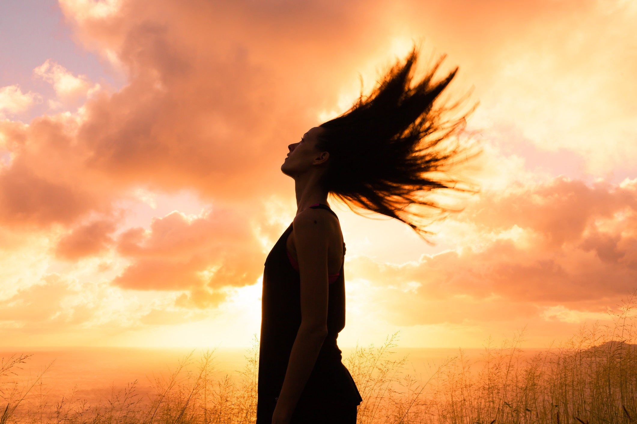 A girl whose hair is flying