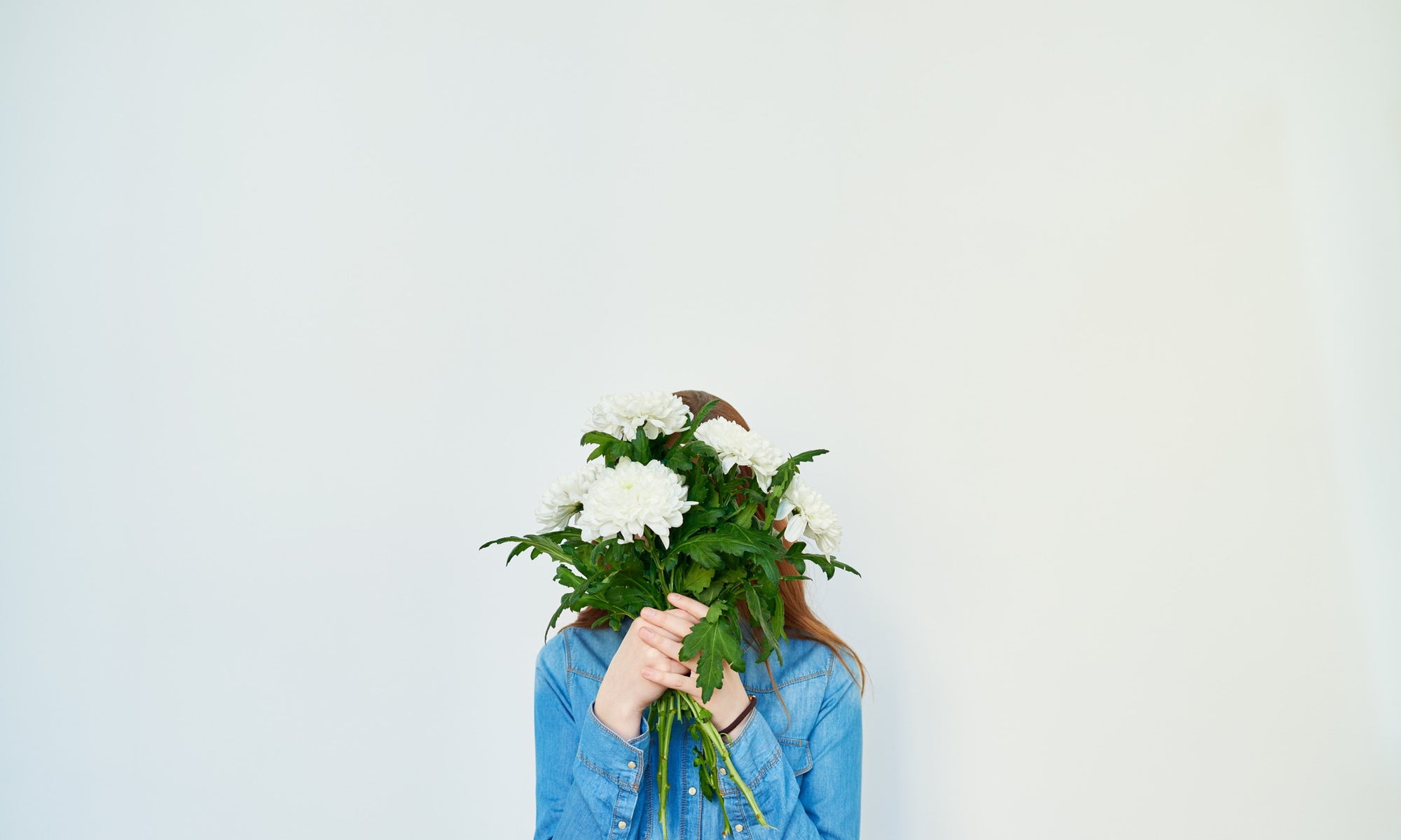 lady Covering Her Face with Flowers 