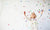 Happy little child girl with colorful confetti on white background