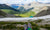 Person sitting on a high mountain top with first person perspective view, legs in focus