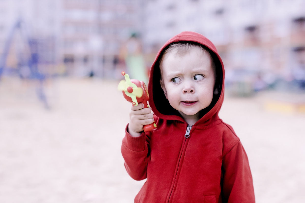 little boy with gun