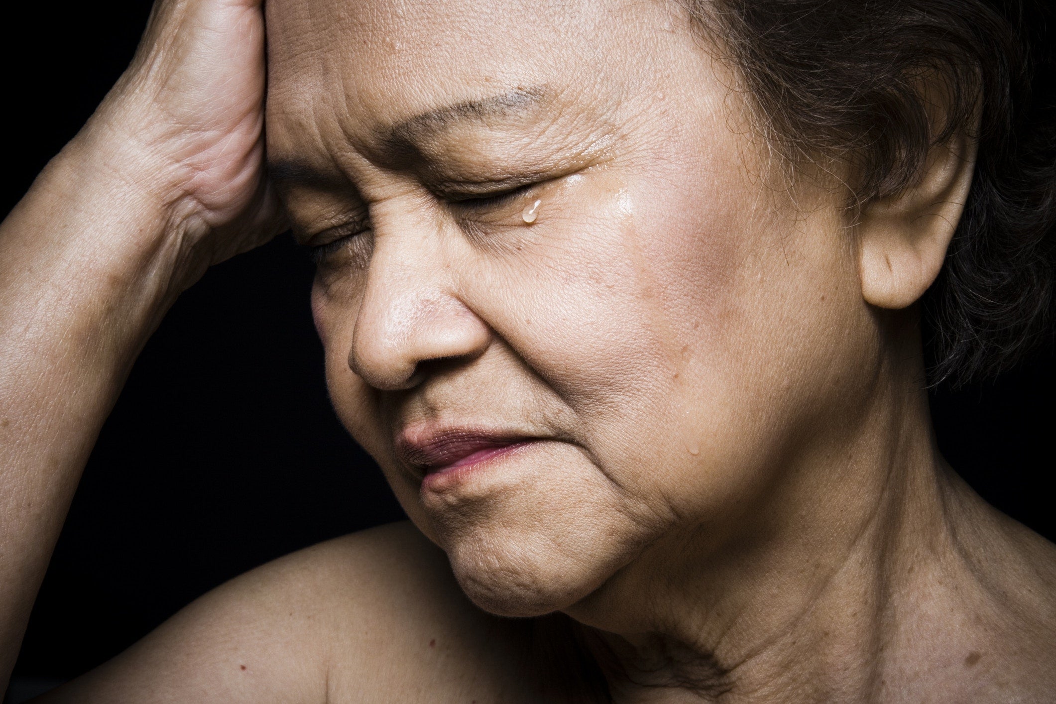 Old lady face with eye drop