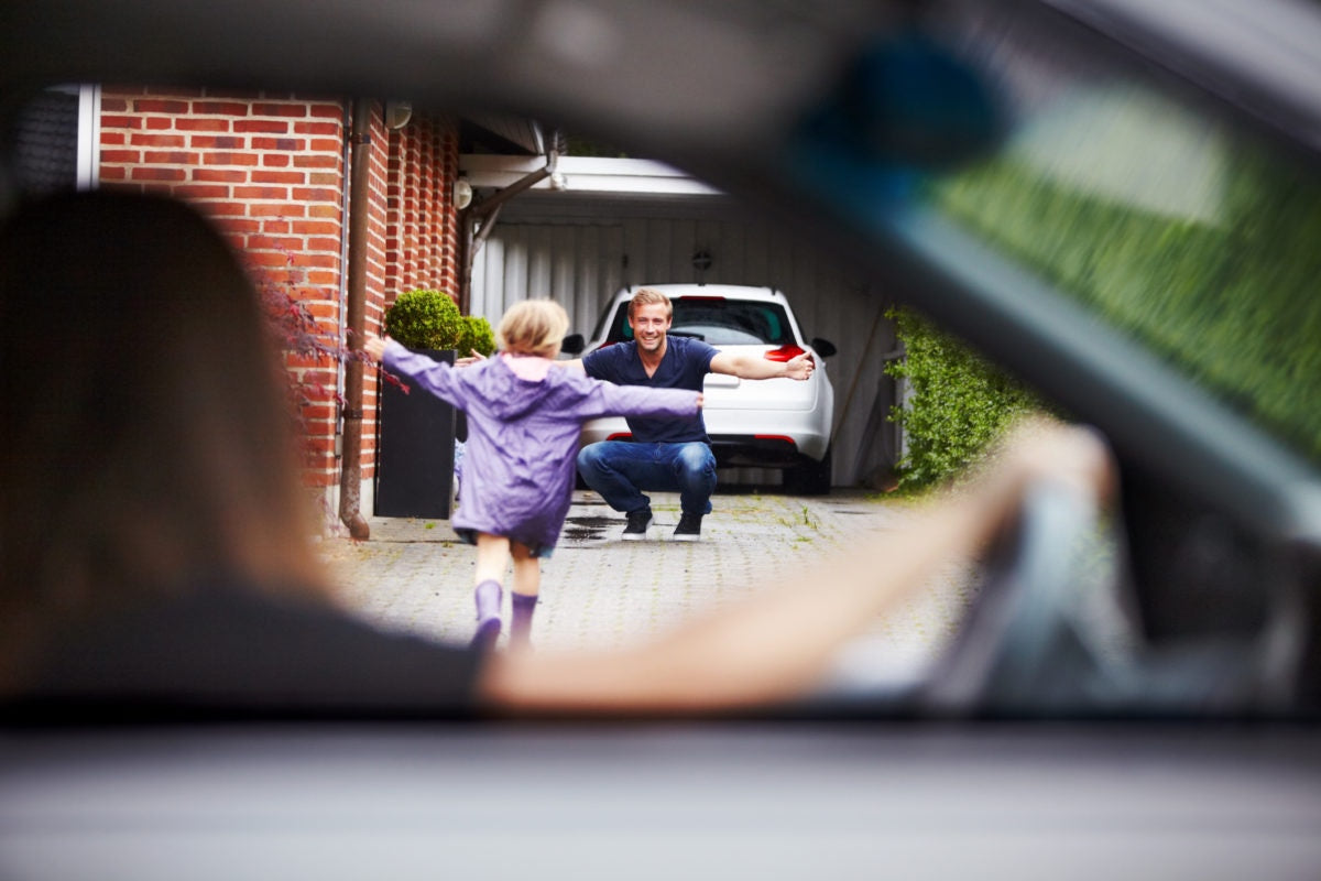 Car view  : father going to hug child