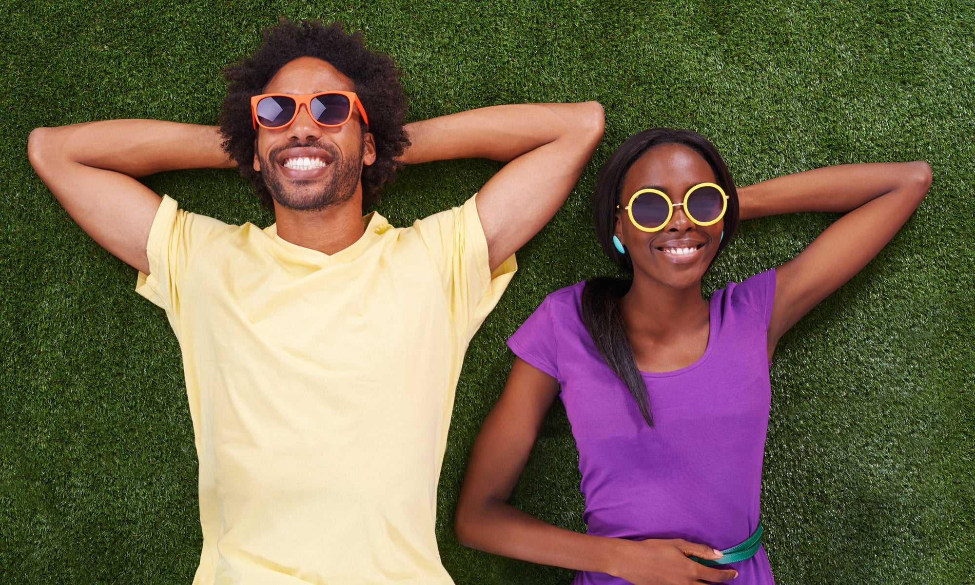 Couples watching sky by wearing goggles