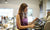 girl preparing coffee using coffee machine