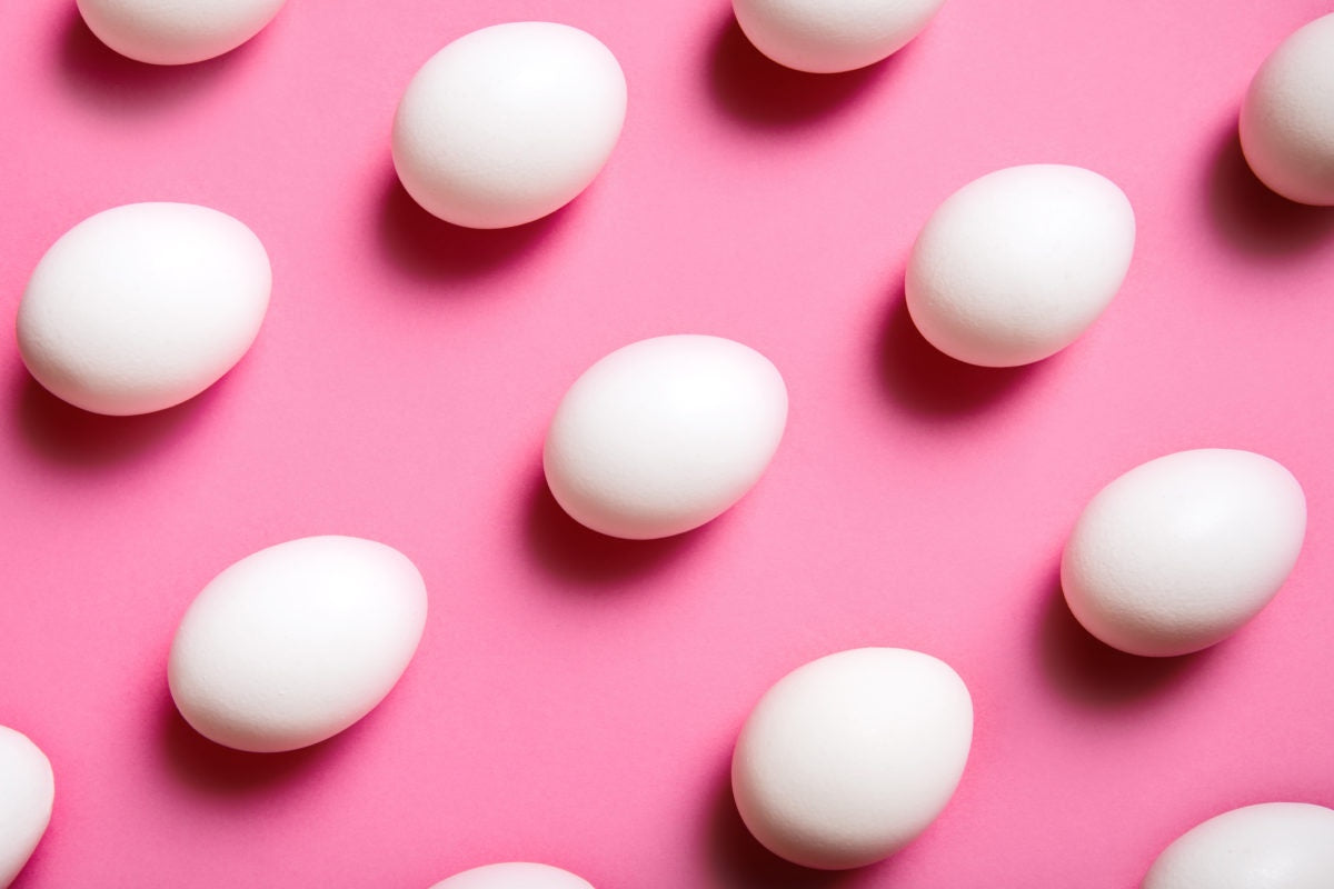 pink background with white eggs