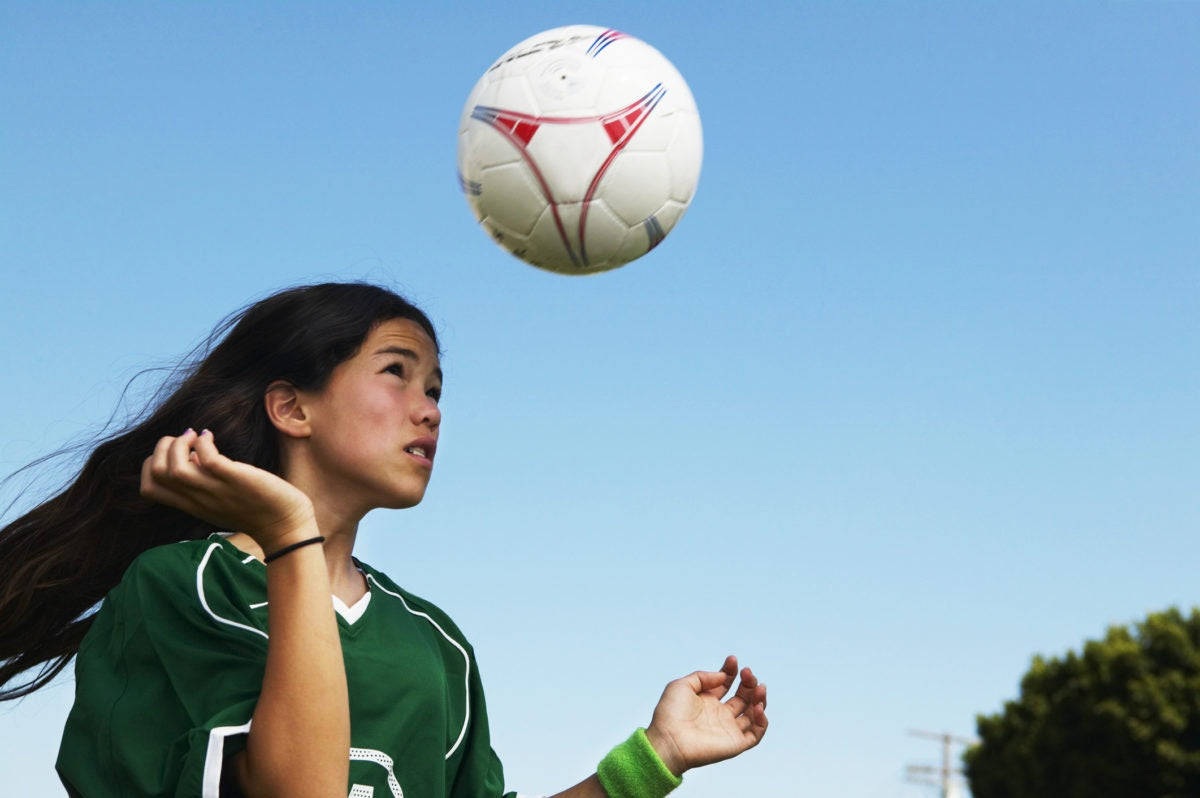 young girl playing volleyball