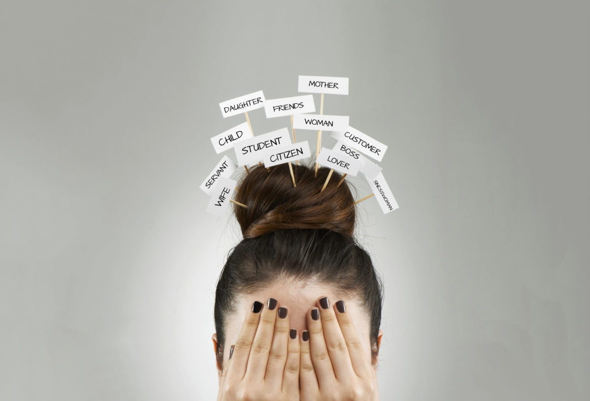 woman with different topis above her head