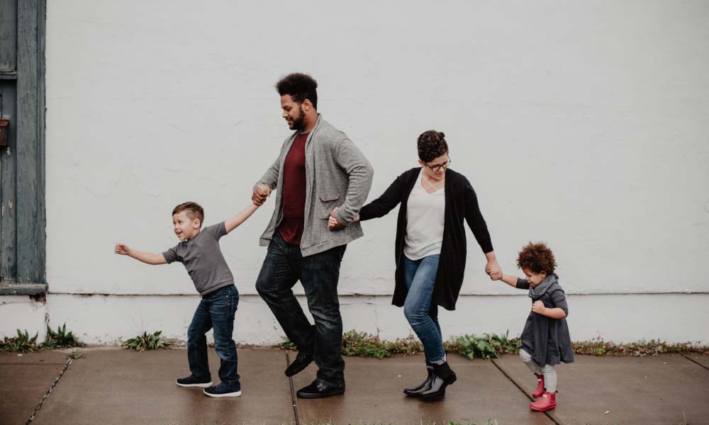 family walking on the street