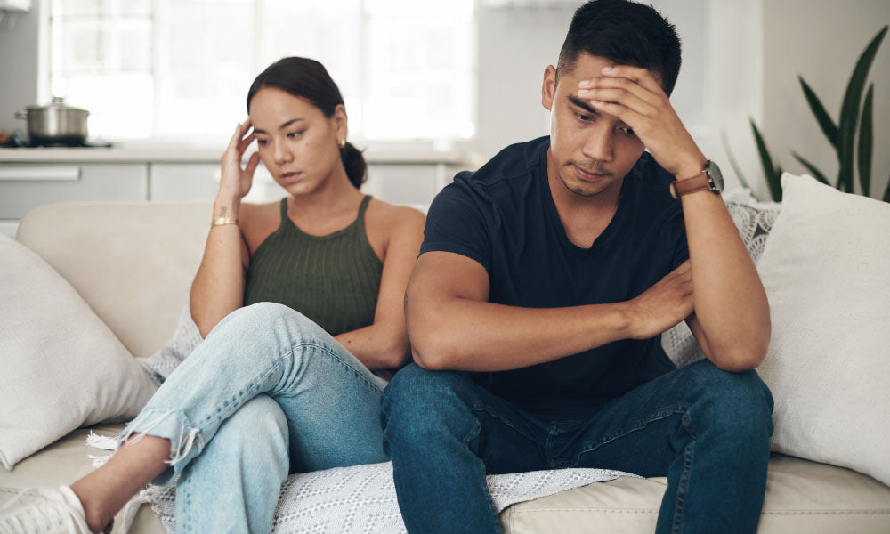 man and woman on couch