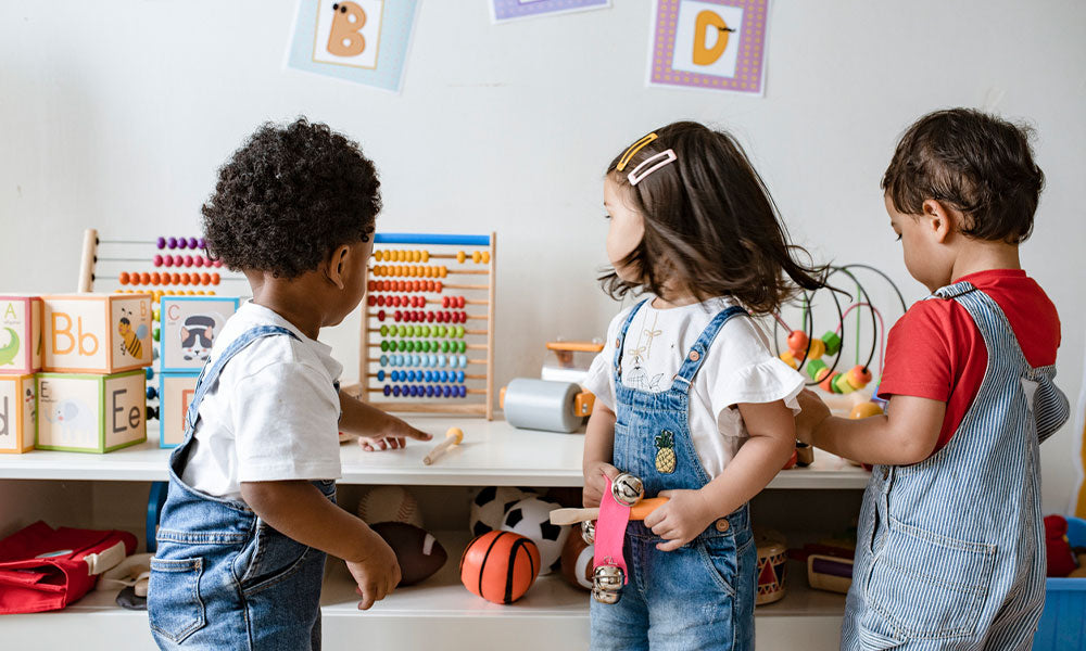 young children playing with 